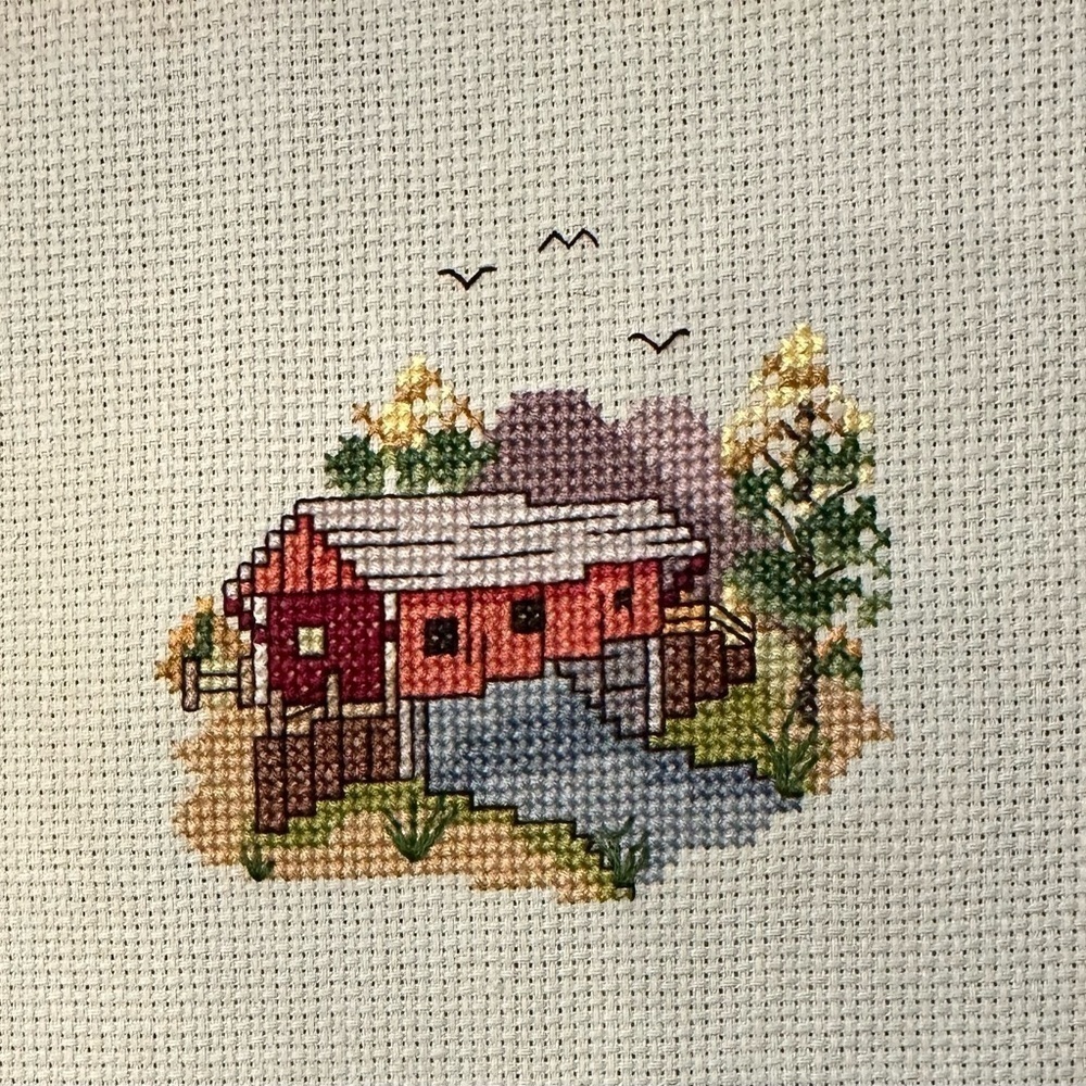 Counted Cross-Stitch completed 8”x12” panel of a Covered Bridge